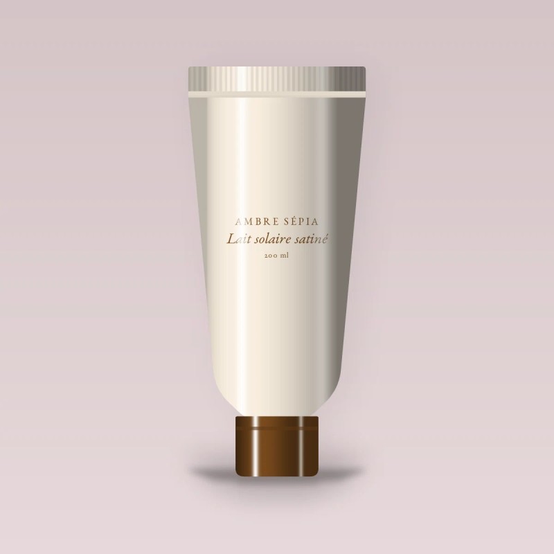 Lait solaire satiné à l'huile de tamanu SPF 50+ – Ambre Sépia, tube 200 ml
