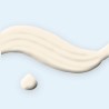 Lait solaire nourrissant à l'huile de coco SPF 50+ – Halvène, aperçu de la texture